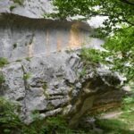 Ancient stone steps carved into a cliff along the trail in Eremo San Giovanni all’Orfento