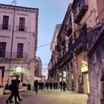 Evening walk along the main street of Sulmona in winter