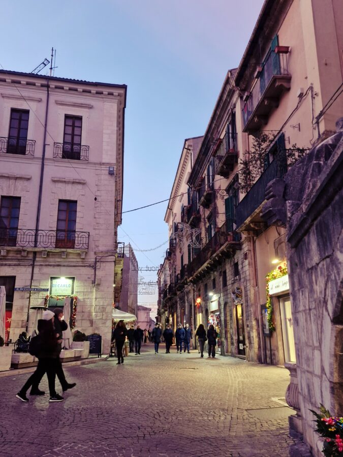 Evening walk along the main street of Sulmona in winter
