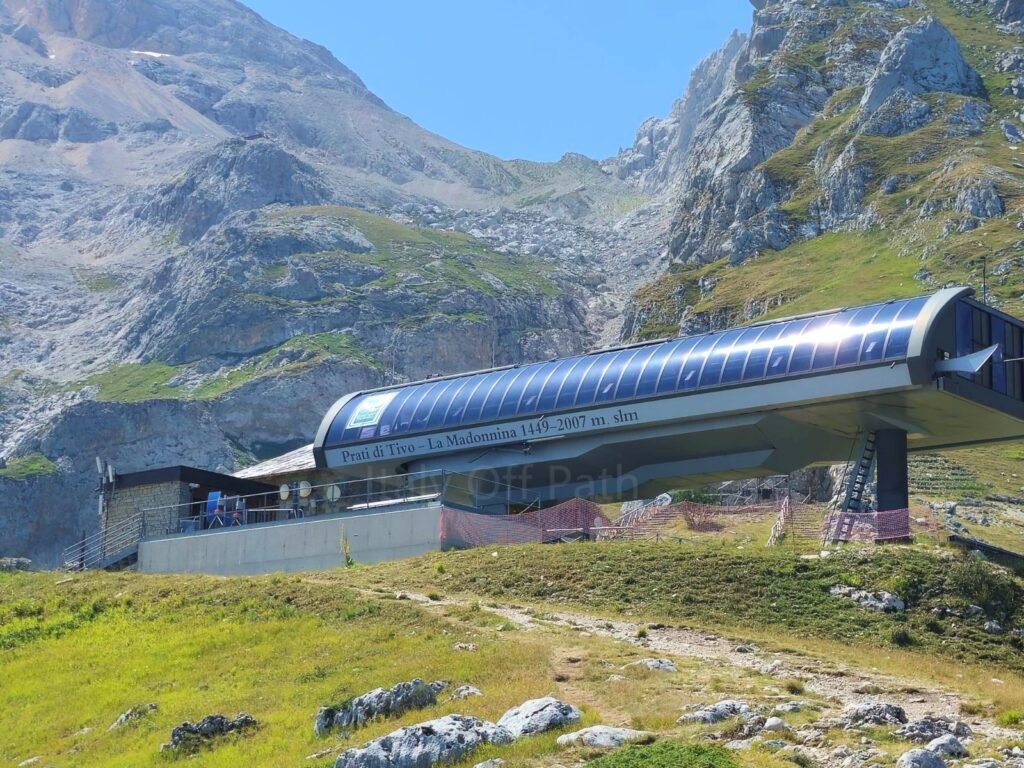 La Madonnina cable car station at Prati di Tivo situated at 2007 meters against the rocky slopes of Gran Sasso, Abruzzo, Italy.