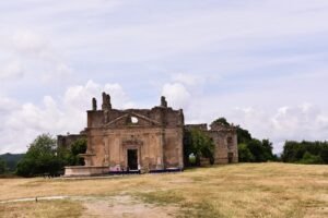 Ruins of the Church and Monastery of San Bonaventura in the abandoned town of Antica Monterano ghost town, Lazio, Italy.
