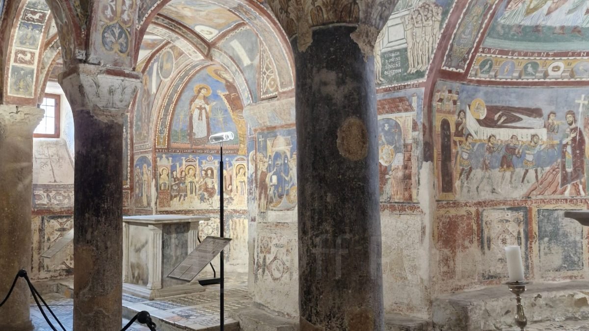 Medieval frescoes and Cosmatesque mosaic floor inside the Crypt of St Magnus Anagni Cathedral, Lazio, Italy.